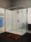 Clean glass shower screen around shower in modern bathroom