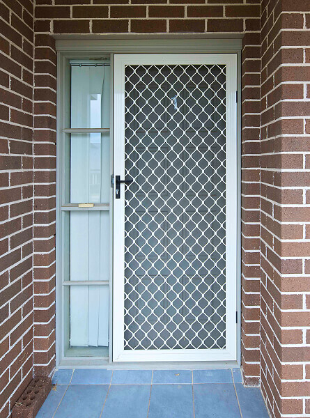 Diamond Grille door at front of home